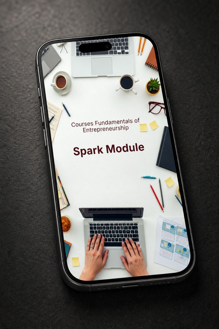 A smartphone lying on a dark textured surface, displaying a course cover titled 'Spark Module' from 'Courses Fundamentals of Entrepreneurship'. The phone screen shows a desk scene with laptops, coffee cups, sticky notes, and hands typing.